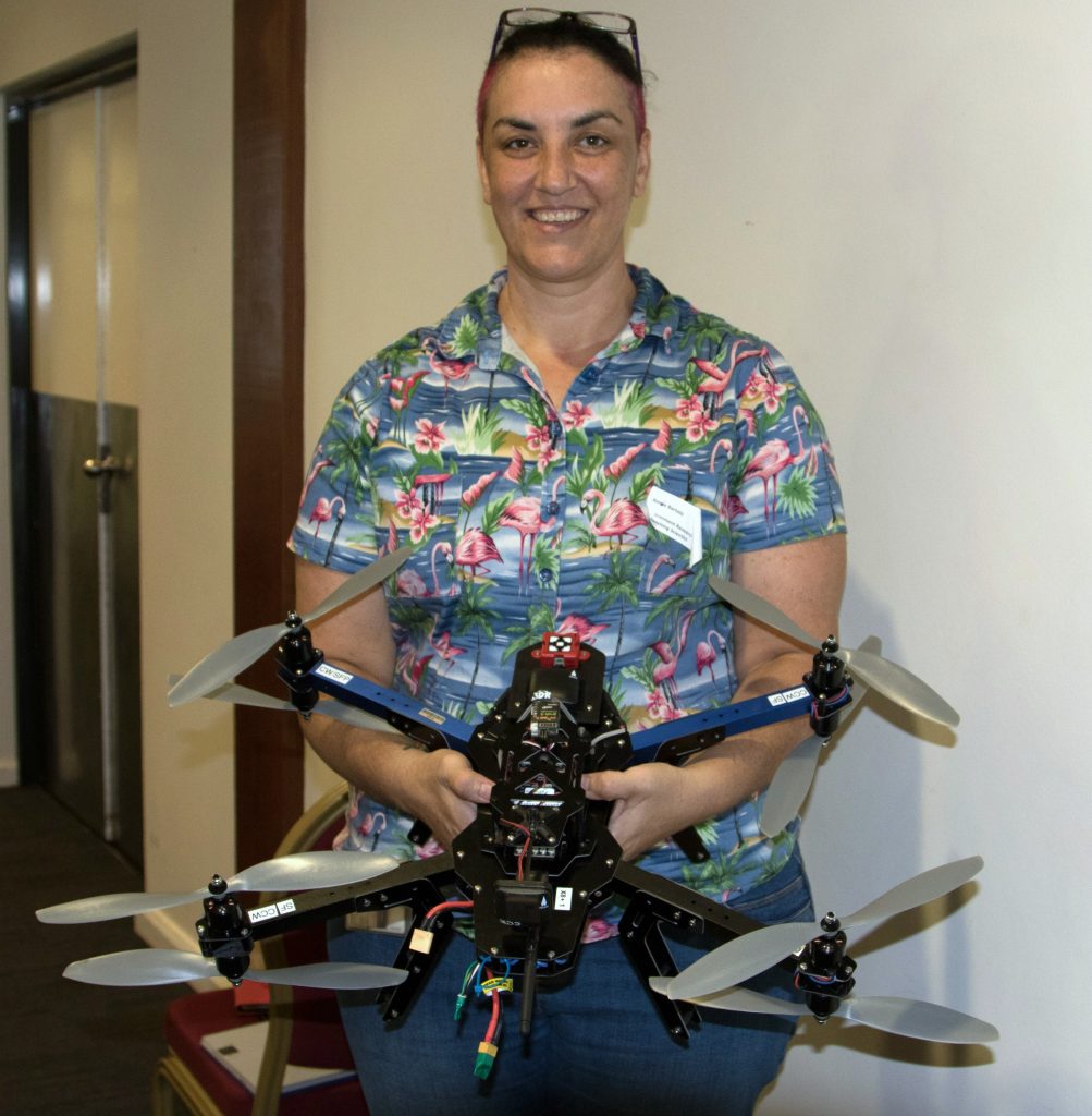 One of the research experts Dr Renee Bartolo from eriss holds a drone (1)