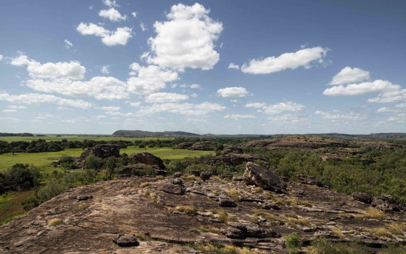 Photo of Ubirr looking out over the floodplain with scattered clouds