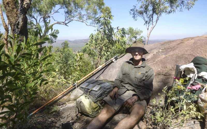 Luke Einoder Profile picture for Luke Einoder. Outdoors after completing fauna sampling with kit bag at his side.