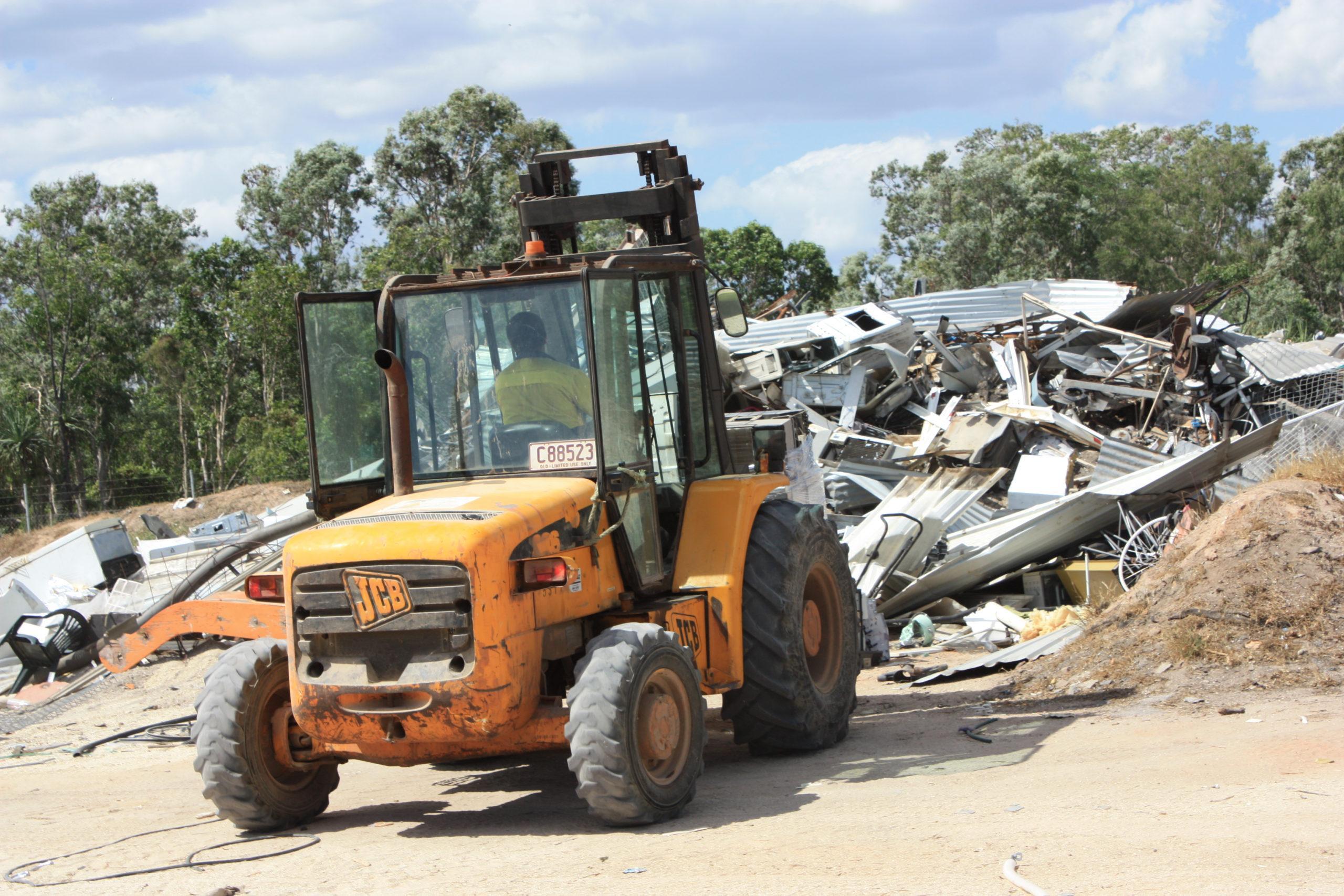 Waste separation at the Pormpuraaw waste facility.