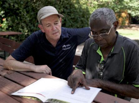 Prof Michael Douglas and Victor Cooper reading the Kakadu Research Strategy.
