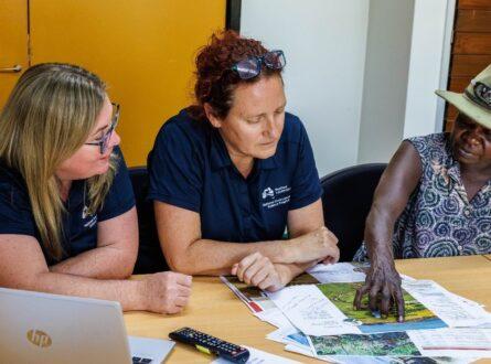 Natalie Rossiter-Rachor (Charles Darwin University, NESP Project leader), Rebecca Dobbs (The University of Western Australia, NESP Project leader) and Connie Nayinggul, (Kakadu Traditional Owner and NESP Project leader) working on a draft of the Kakadu Research Strategy. Photo courtesy: Michael Douglas.