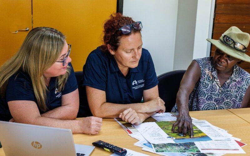 Natalie Rossiter-Rachor (Charles Darwin University, NESP Project leader), Rebecca Dobbs (The University of Western Australia, NESP Project leader) and Connie Nayinggul, (Kakadu Traditional Owner and NESP Project leader) working on a draft of the Kakadu Research Strategy. Photo courtesy: Michael Douglas.